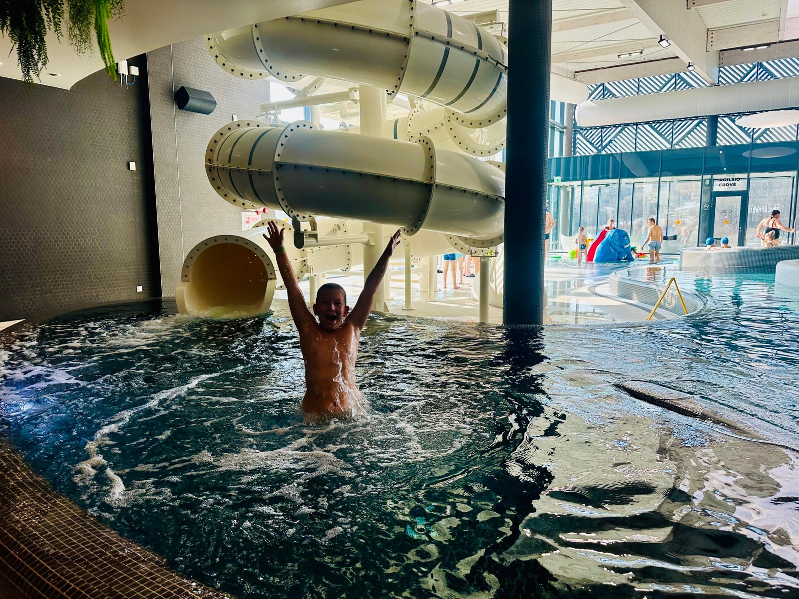 Swimming pools with water slides