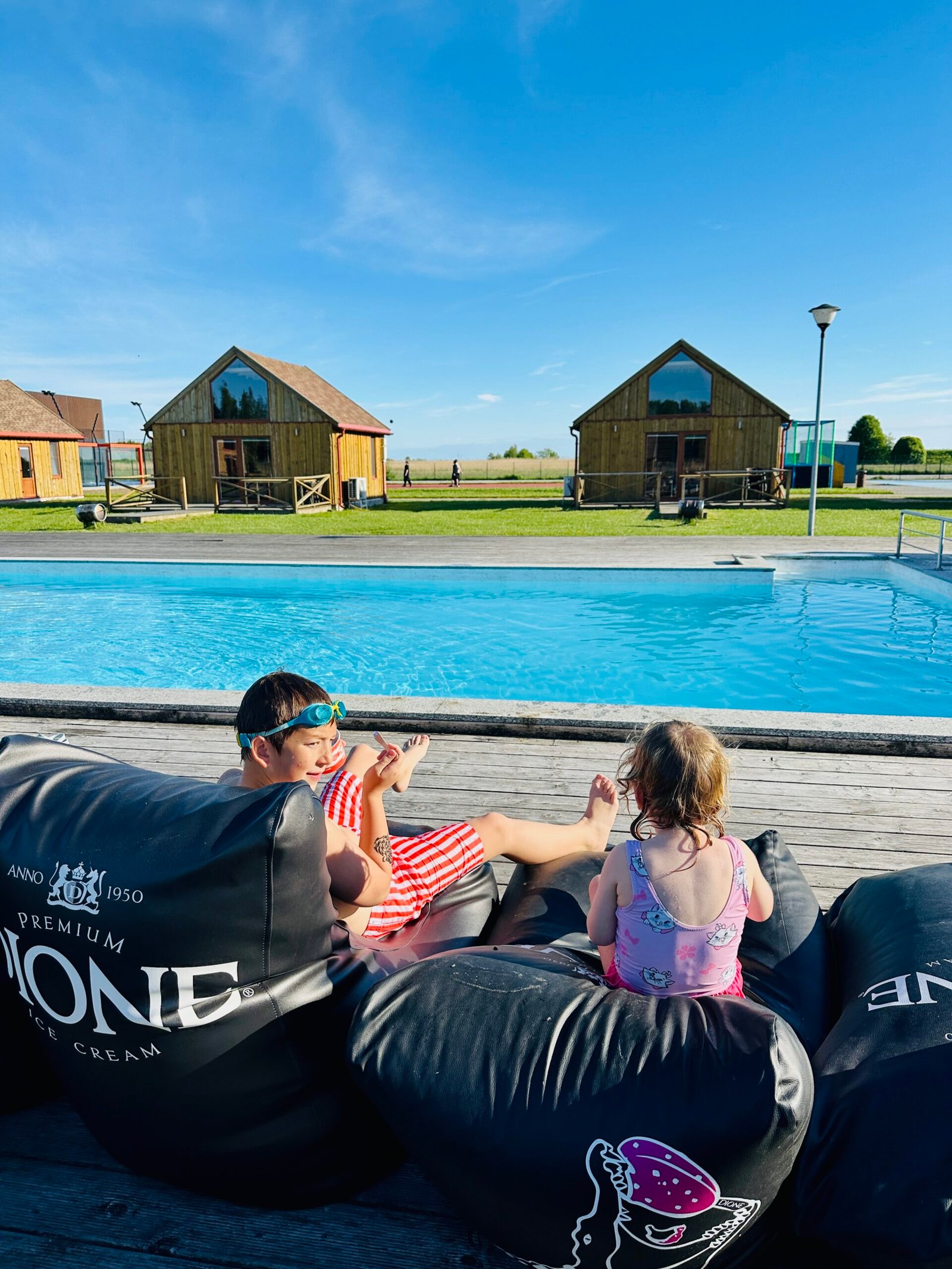 Heated outdoor pools with water slides for kids in Lithuania