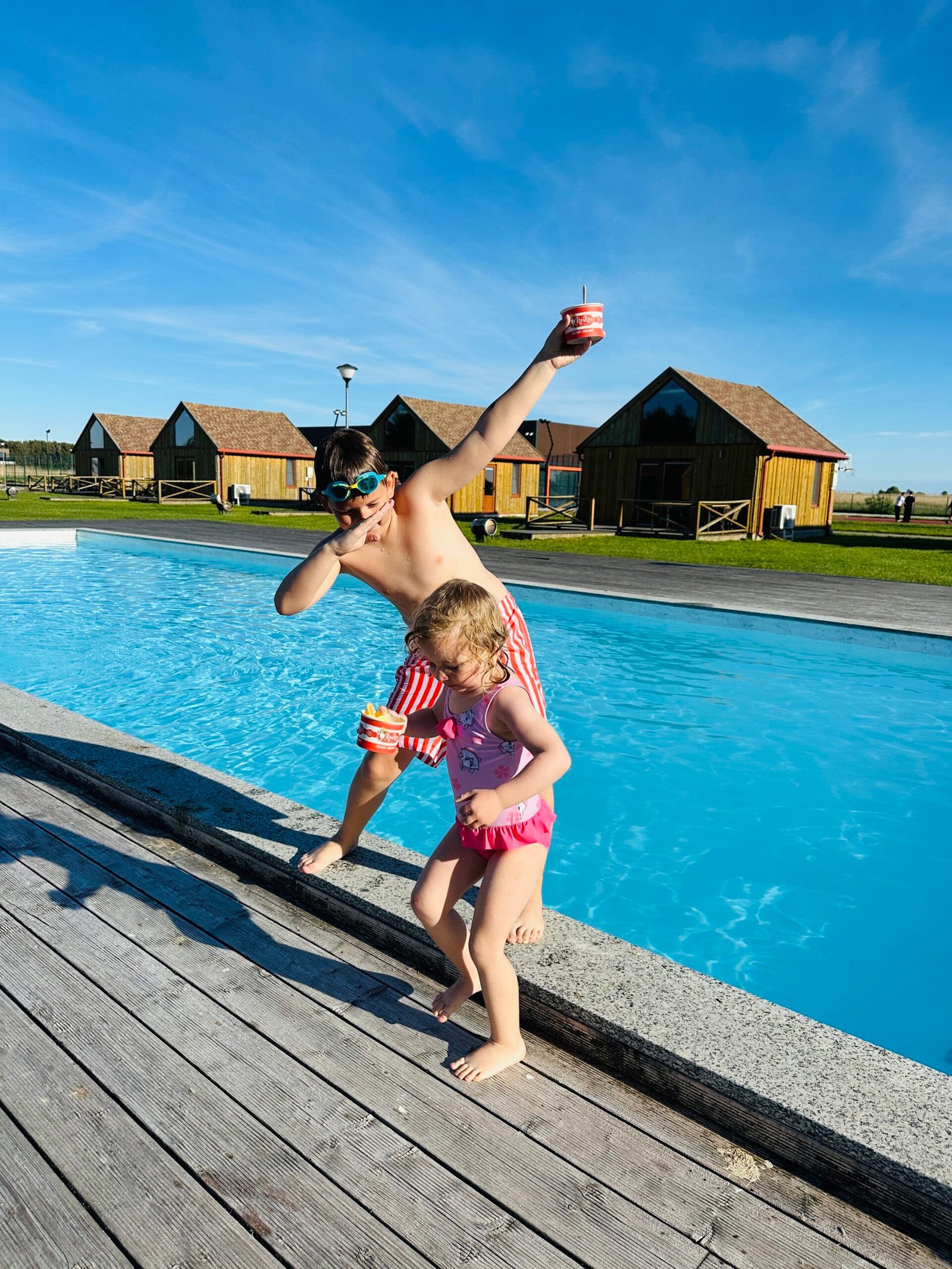 Heated outdoor pools with water slides for kids in Lithuania