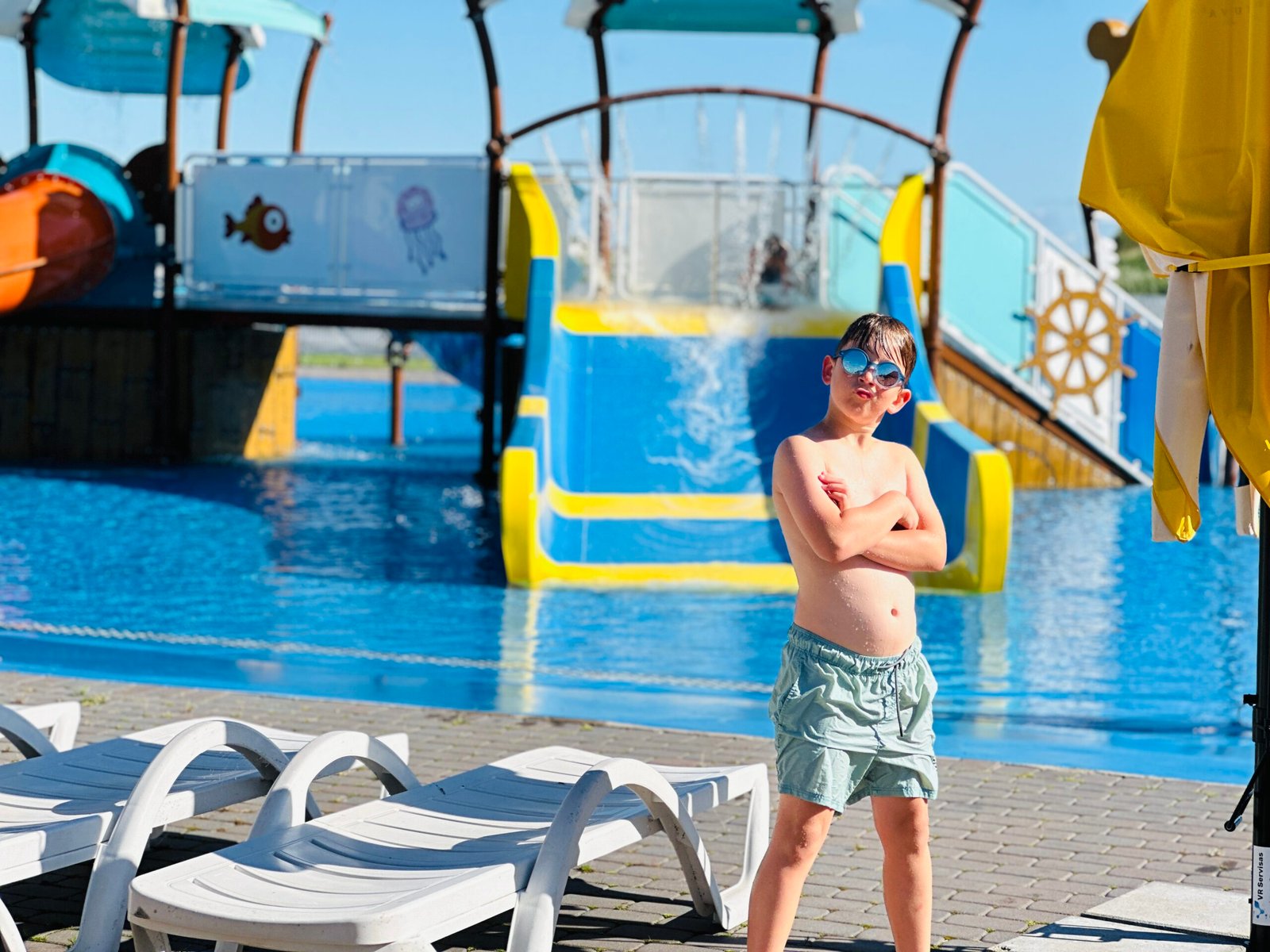 Outdoor pools with water slides for kids in Lithuania
