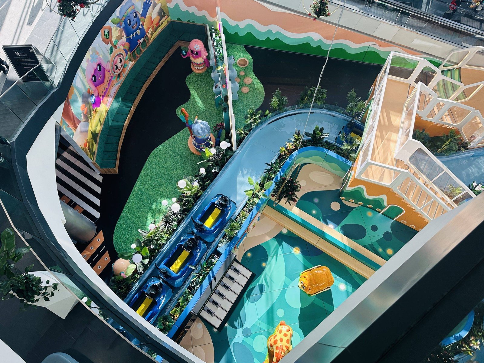 Hopa Lupa Island with a sand play area and water boats