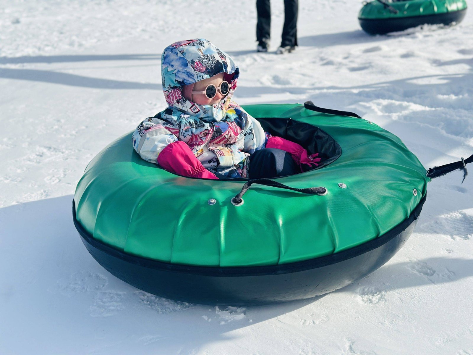 Winter activities for young children - skiing with tubes