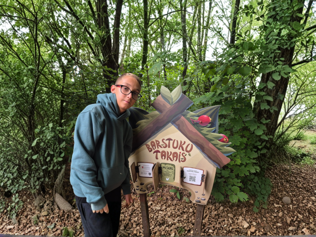 forest trail near Kaunas: Lithuanian mythology barstukai houses